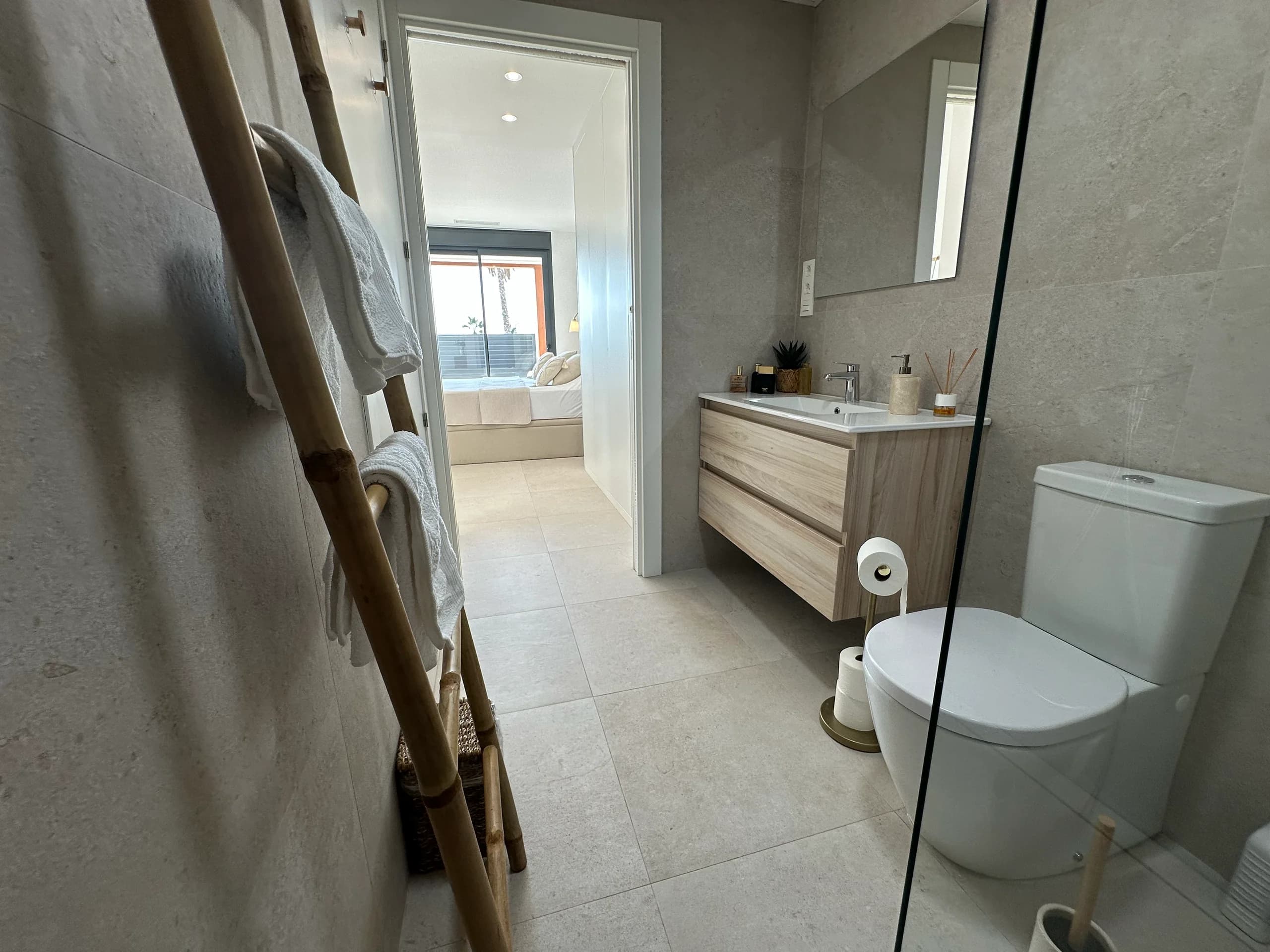 Villa Bella Sol — bedside detail with nightstand and lamp