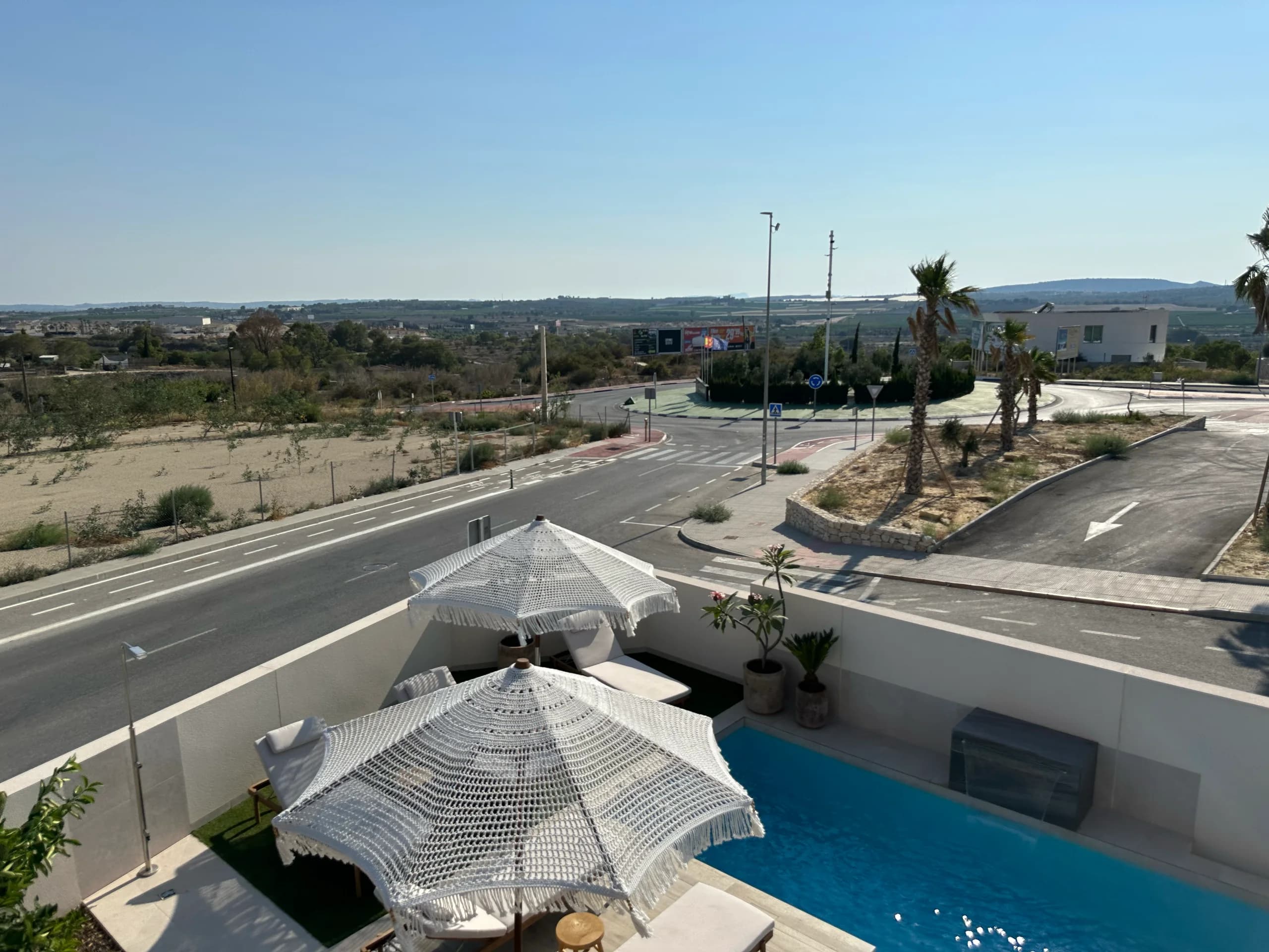 Villa Bella Sol — outdoor lounge with cushions and low table